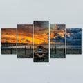 Sun set over the ocean beach image reprinted on canvas image 1